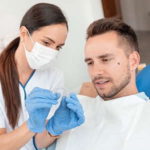 Patient and dentist discussing Invisalign in North Naples