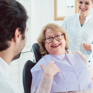 Patient smiling after learning the cost of a dental crown in Naples