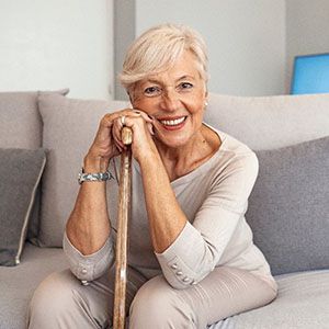 Woman after learning how dentures are made in North Naples