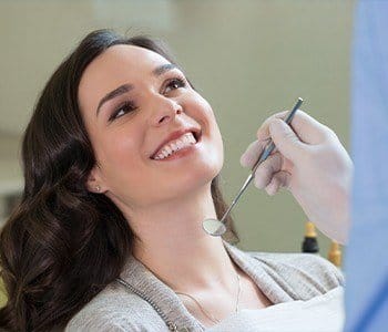 Smiling woman in dental chair