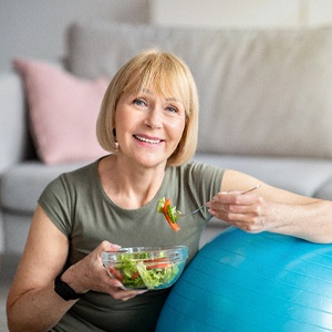 Woman eating a salad in North Naples