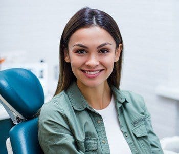 Smiling woman in dental chair