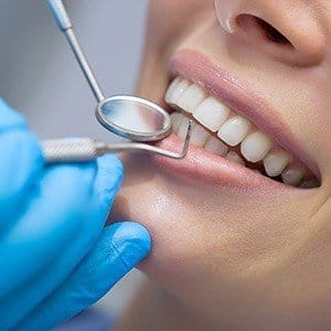 Patient receiving dental treatment