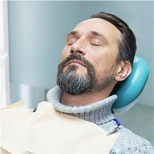 Relaxed man in dental chair