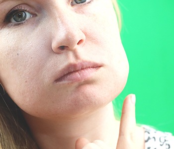 Woman with a swollen cheek
