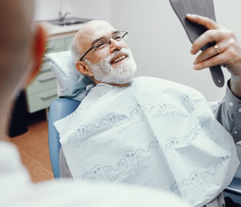 Man smiling in the dental chair