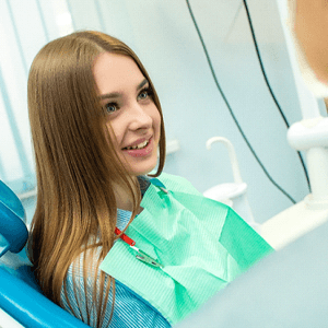 Patient listening to sedation dentist in North Naples