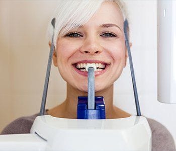 Woman receiving 3D x-ray scan