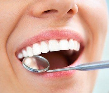 Closeup of patient during dental exam