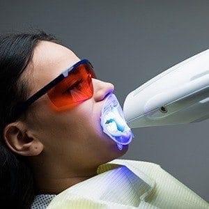 Patient receiving zoom teeth whitening