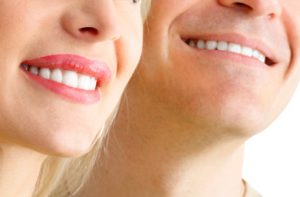 close up of woman and man smiling