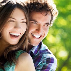 Couple with beautiful smiles thanks to the cosmetic dentist Naples prefers