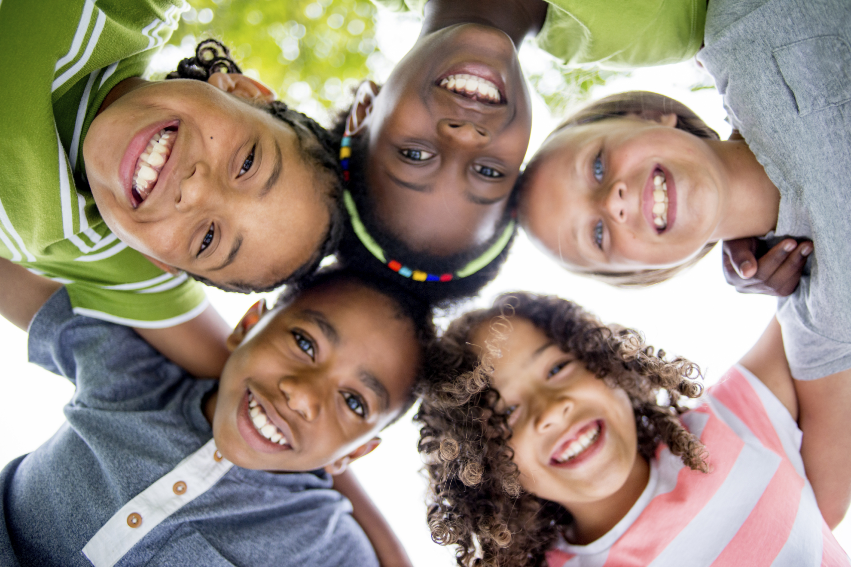 Children Smiling In A Huddle - Mark Makram Dds  Naples Dentist