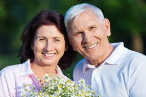 an older couple smiling