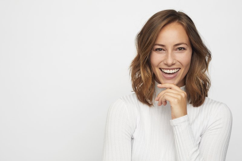 woman smiling after teeth whitening in North Naples