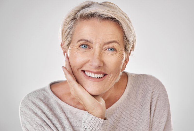 Older woman after Invisalign in North Naples
