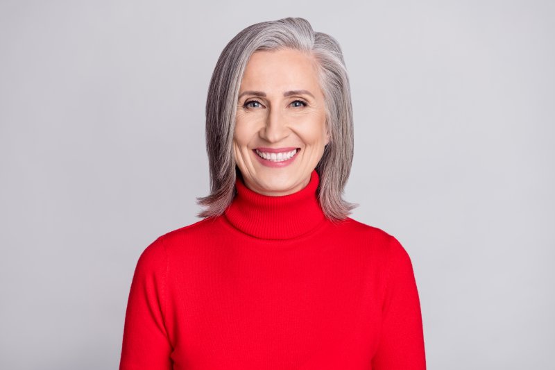 Woman showing healthy smile 