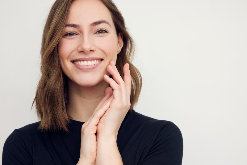 Woman showing healthy smile 