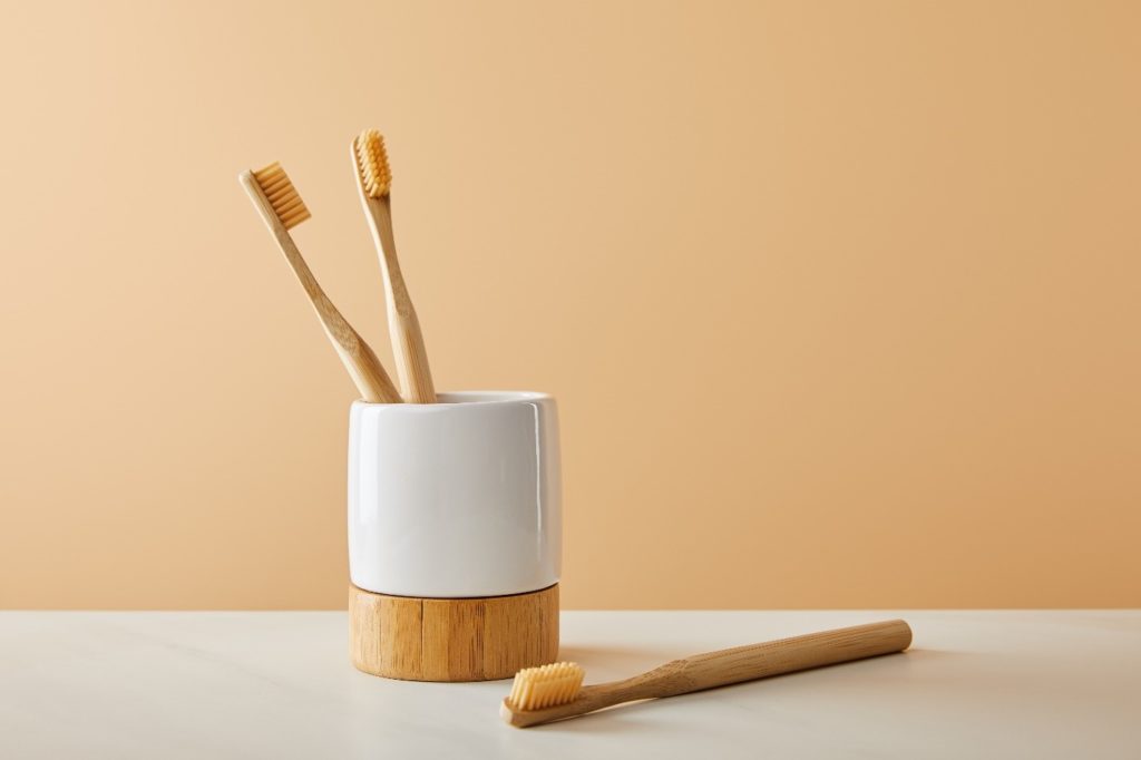 Bamboo toothbrushes in toothbrush holder
