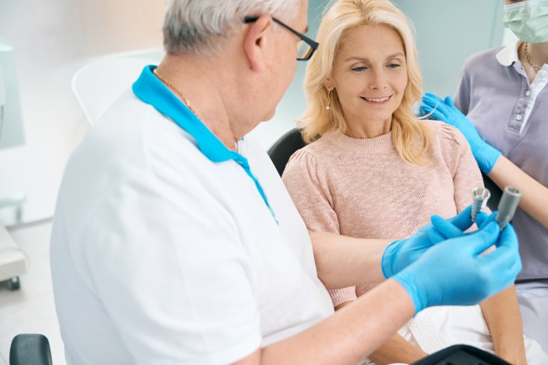 woman undergoing dental implant consultation